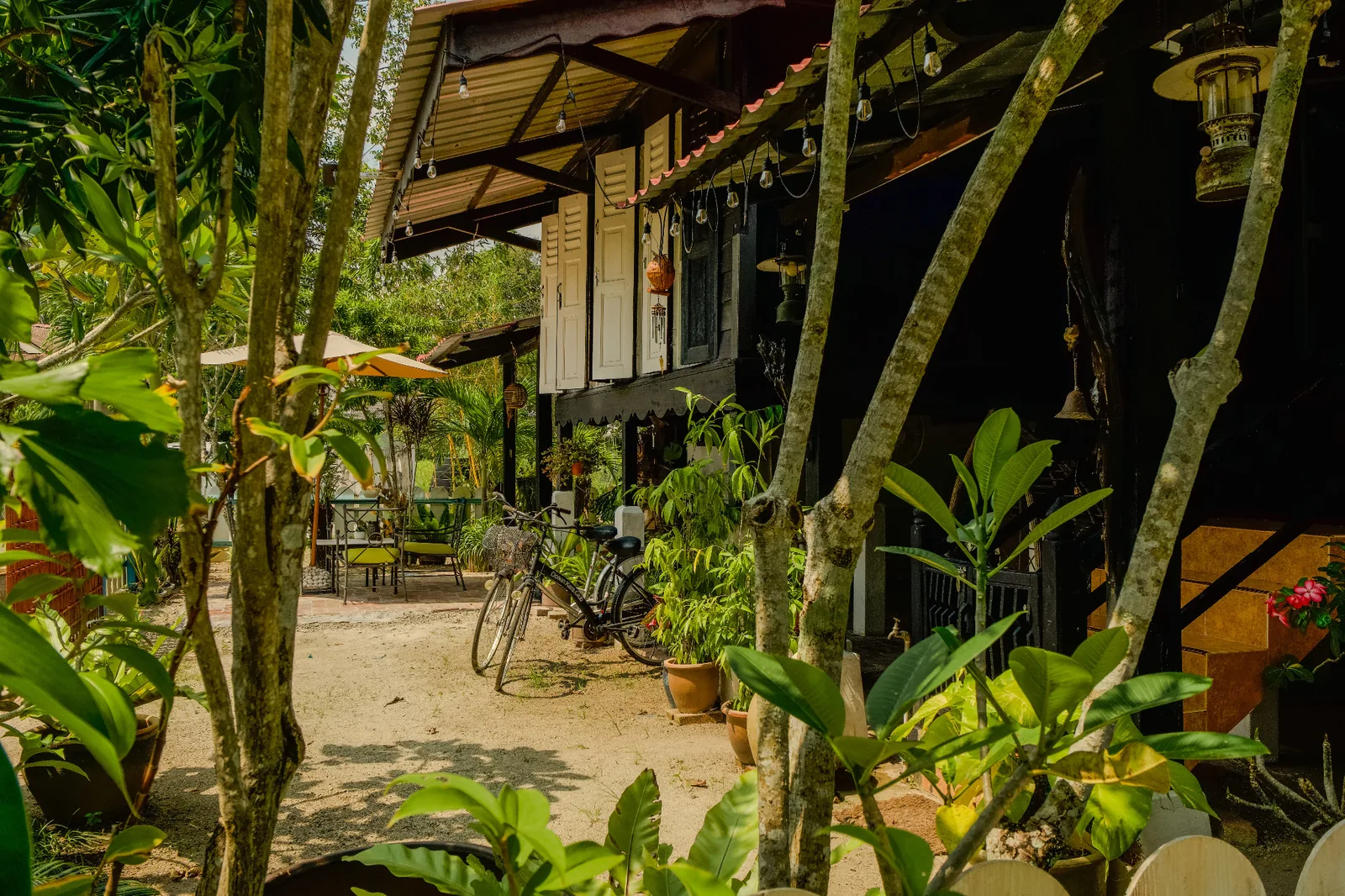 Rumah Teduh Langkawi traditional Malay house surrounded by a tropical garden