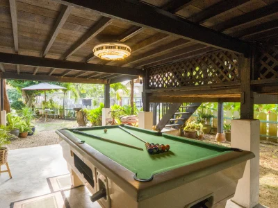 Pool table in the outdoor entertainment area at Rumah Teduh Langkawi