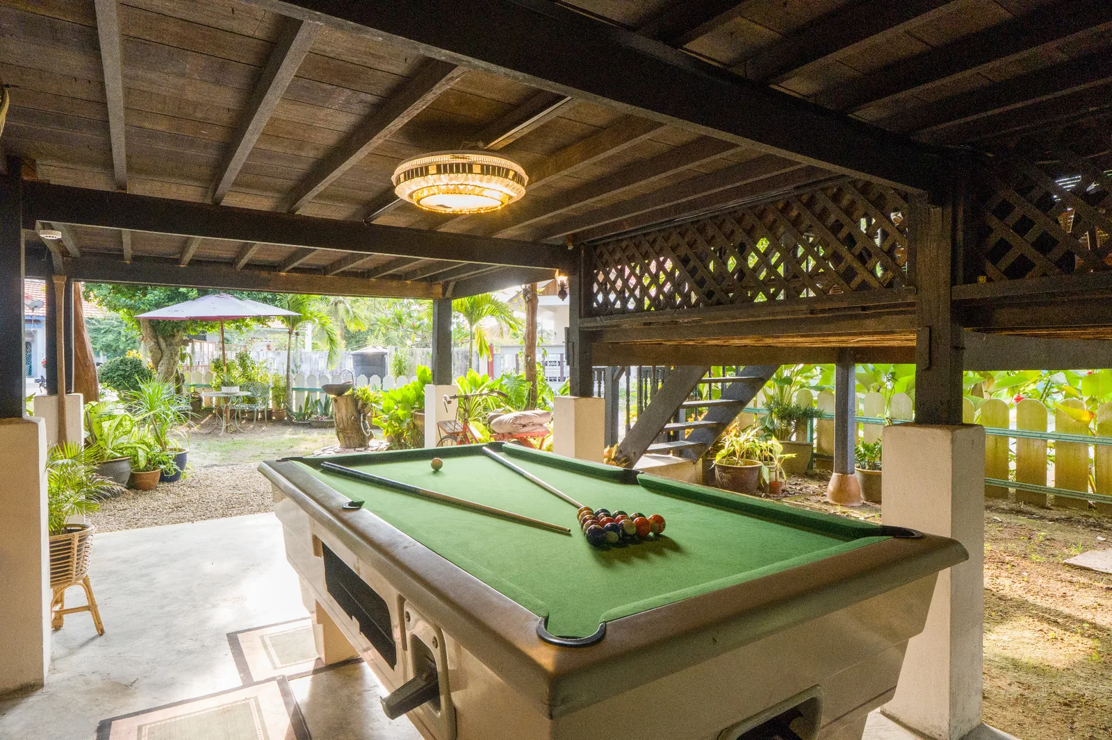 Pool table in the outdoor entertainment area at Rumah Teduh Langkawi